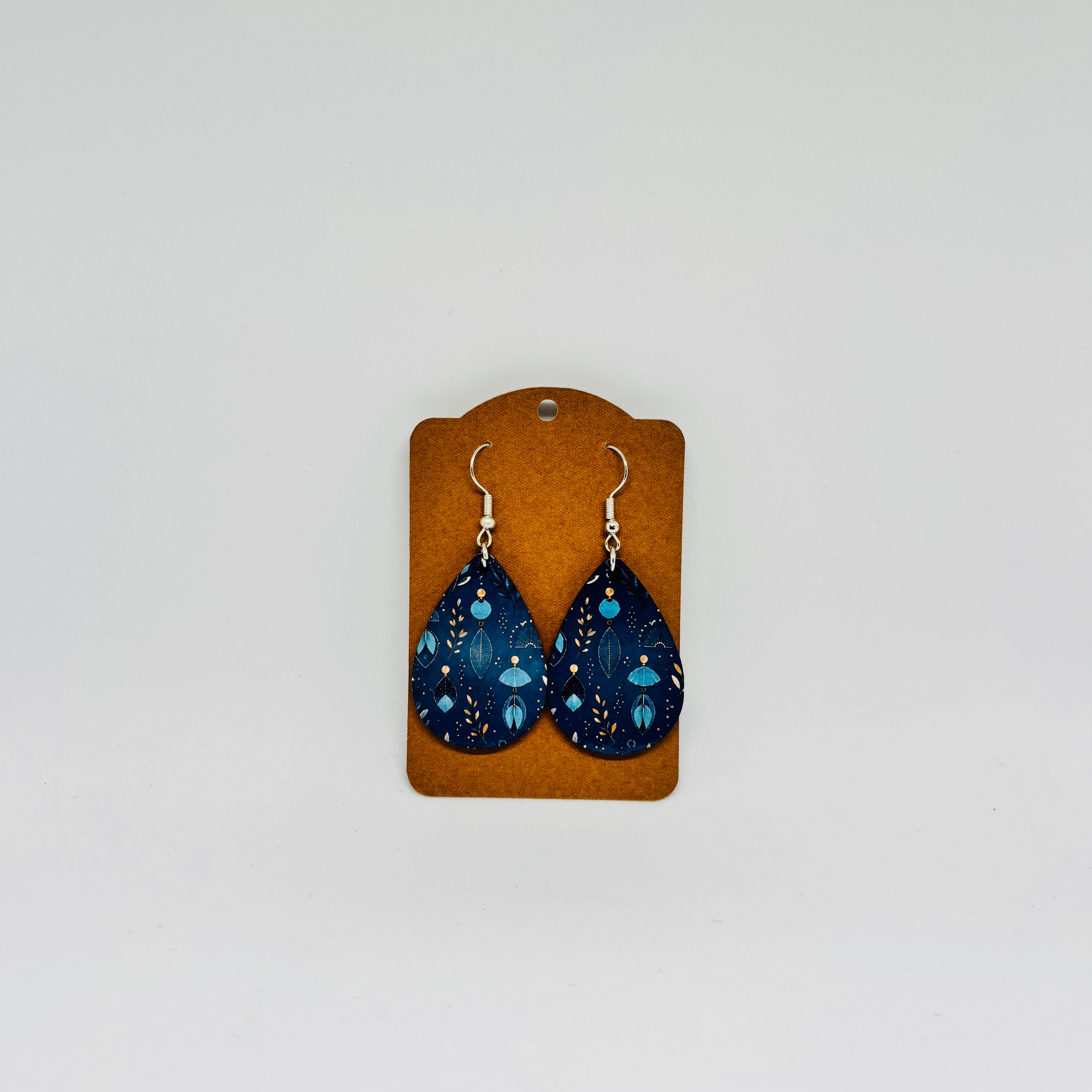Boucles d’oreilles gouttes bleu et or